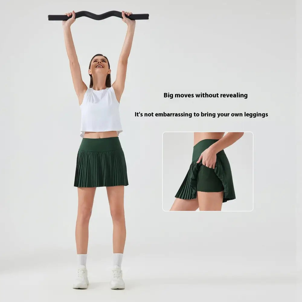 Dark green pleated athletic skirt designed as a purple double layer points exercise skort for three points exercise use