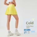A vibrant yellow pleated skirt with a snug high-waisted design in a purple double layer points exercise skort product