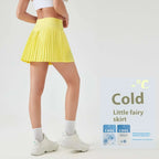 A vibrant yellow pleated skirt with a snug high-waisted design in a purple double layer points exercise skort product