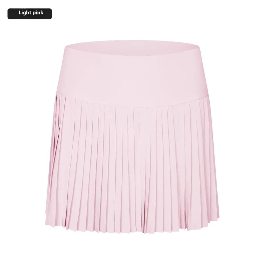 Light pink pleated tennis skirt as part of the purple double layer points exercise skort for active wear