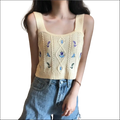 Cream-colored knitted sleeveless purple embroidered floral camisole with intricate blue and purple floral embroidery