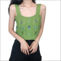 A vibrant green knitted embroidered floral camisole with intricate cable knit patterns and purple blue floral motifs