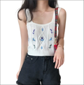 White knitted sleeveless embroidered floral camisole with blue floral embroidery and diamond cable knit design