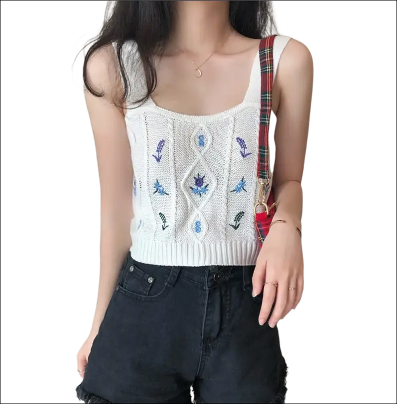 White knitted sleeveless embroidered floral camisole with blue floral embroidery and diamond cable knit design
