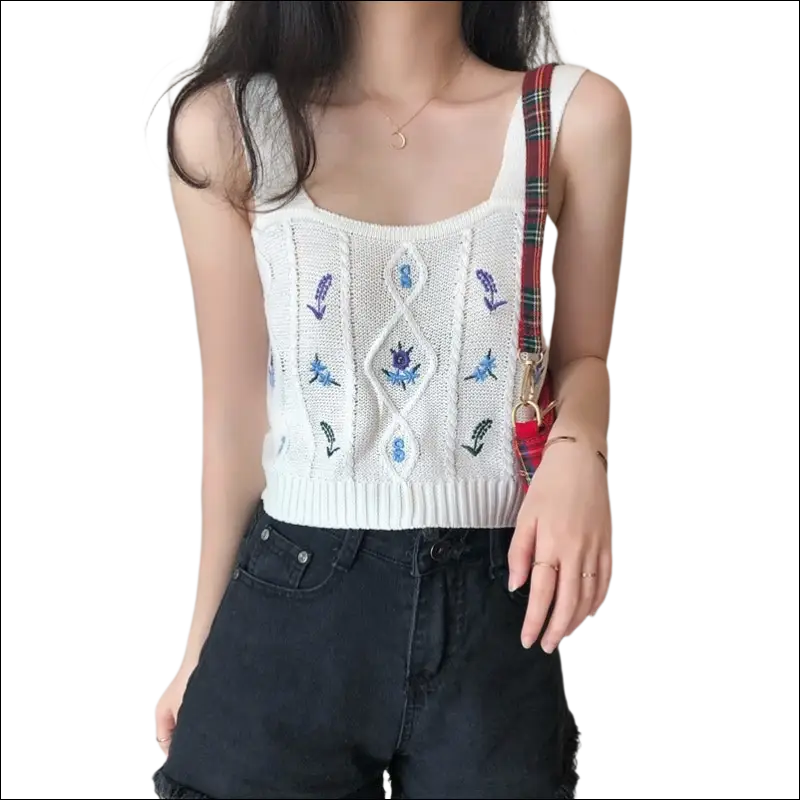 White knitted sleeveless embroidered floral camisole with blue floral embroidery and central diamond pattern