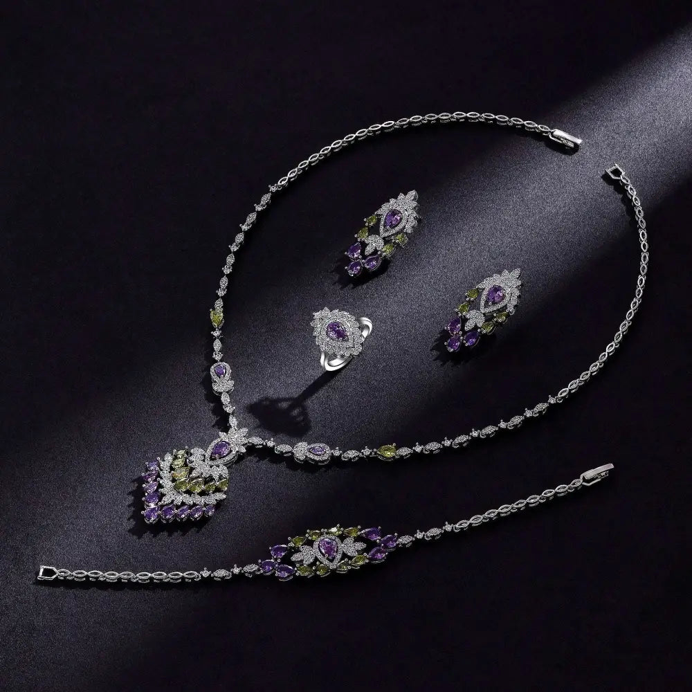 Elegant silver-toned purple floral color zirconium necklace earrings set with green and purple gemstone accents