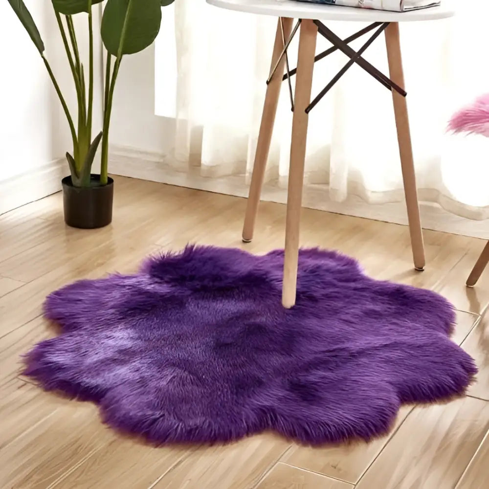 A plush vibrant purple floral shape artificial woolen carpet rug with soft fluffy faux fur texture