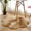 A fluffy light brown sheepskin style rug with soft dense fur for a purple floral shape artificial woolen carpet use