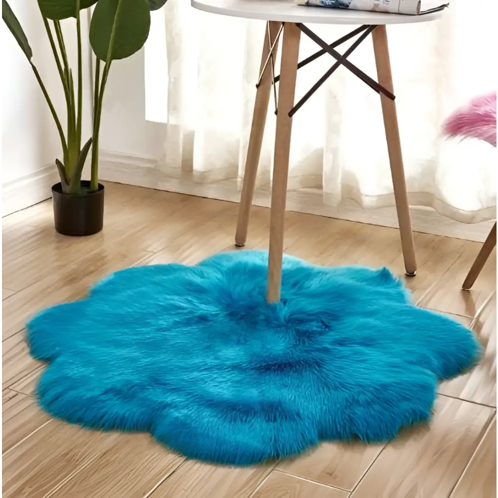 Vibrant turquoise fluffy cloud-like artificial woolen carpet rug with purple floral shape design and floral shape artificial texture