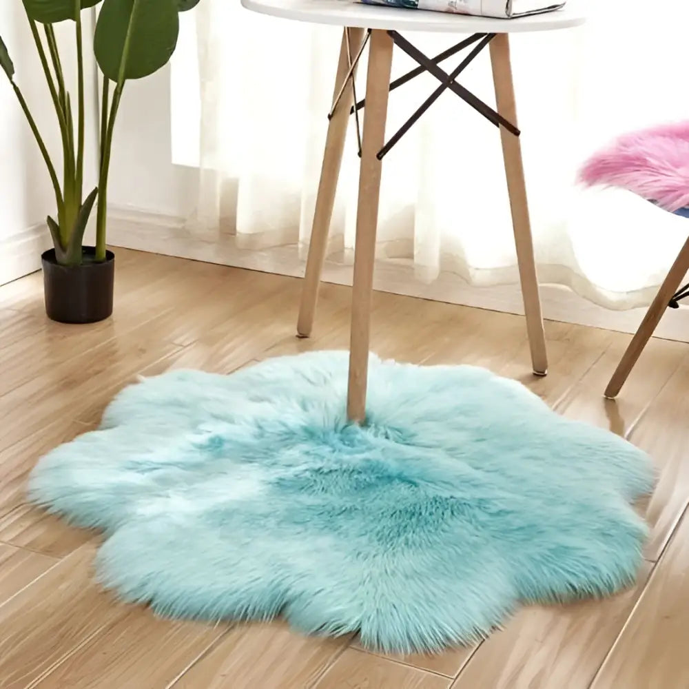 A fluffy light blue floral shape artificial woolen carpet rug with soft faux fur texture perfect for decor