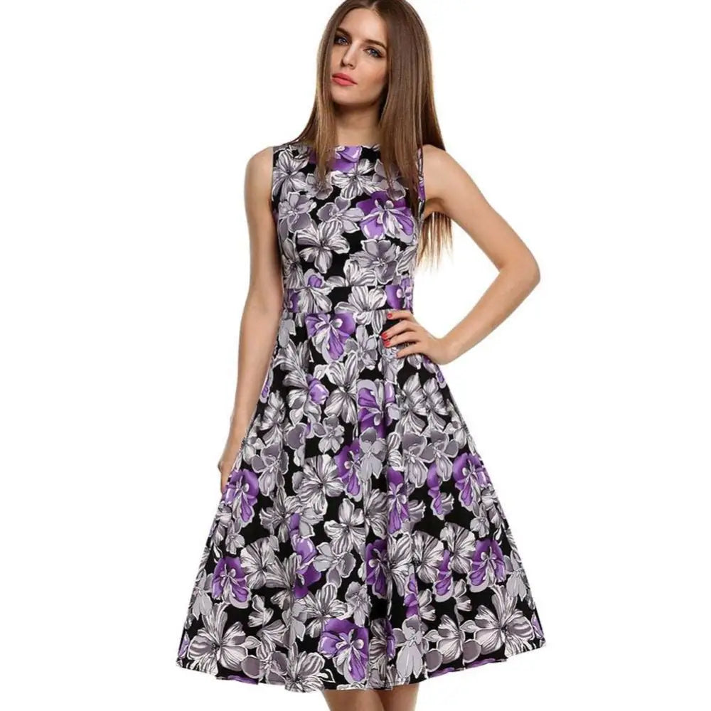 Purple floral sleeveless vintage knee-length dress with black base and vibrant floral print elegant for casual wear