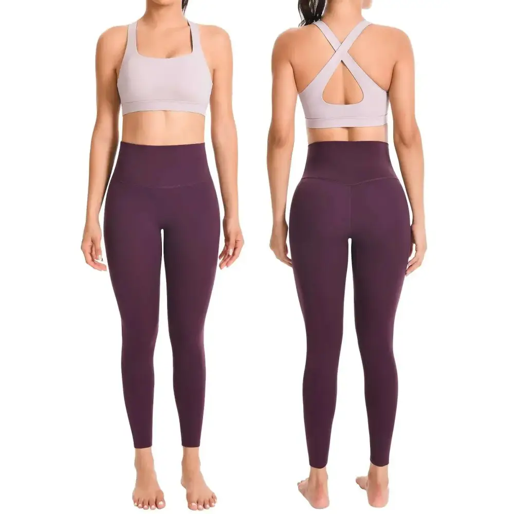 Purple high waisted leggings and sports bra gym set in muted purple and lavender with seamless supportive design