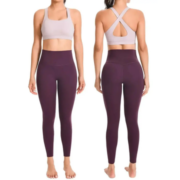 Purple high waisted leggings and sports bra gym set in muted purple and lavender with seamless supportive design