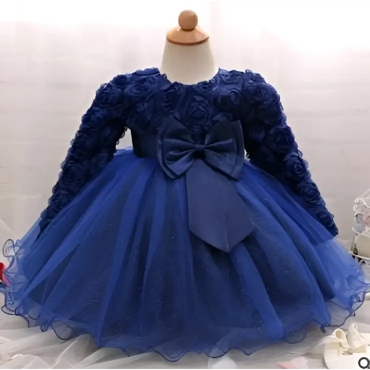 Royal blue floral appliqué dress with long sleeves and tulle skirt featuring oversized satin bow for rose wedding dress