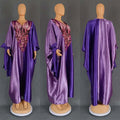 Purple patterned ethnic style loose plus size dress in purple satin with intricate pink and gold embroidery on front