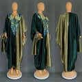 A luxurious loose plus size ethnic style dress featuring a two-toned emerald green and olive gold satin abaya with blue and gold embroidery