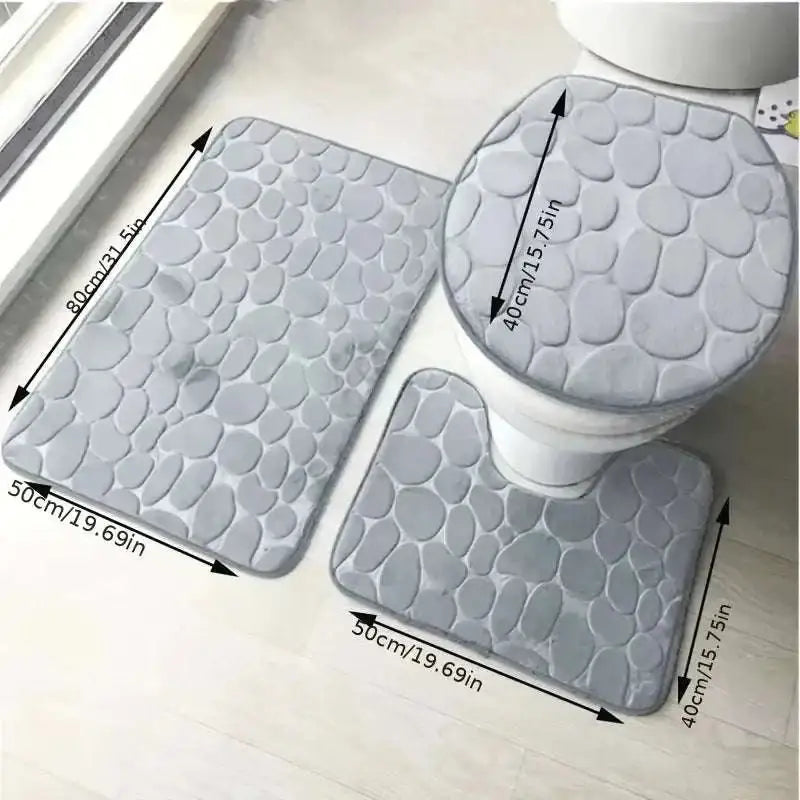 Gray pebble textured three piece bathroom rug set including toilet lid cover for purple pebble collection