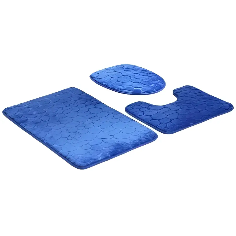 Blue textured bathroom rug set with pebble-like pattern complementing purple pebble toilet lid cover