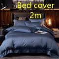 Deep navy blue satin embroidered four-piece bed cover set with fabric main component and subtle logo at the foot