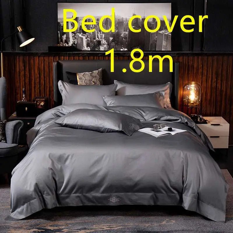 Dark gray satin bed cover with subtle sheen and embroidered logo at foot in purple satin embroidered four-piece set fabric main component
