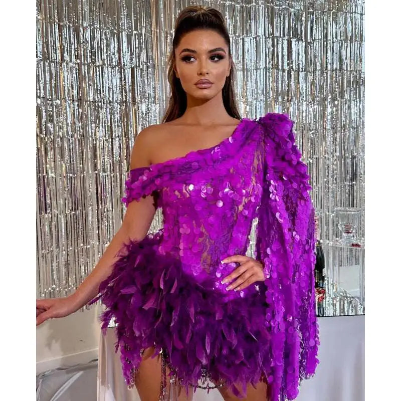 A vibrant purple sequined feather one-shoulder short dress with feather sleeve short and sequined feather skirt details