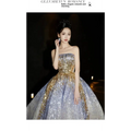 Purple tube embossed toast dress featuring a shimmering gold sequined strapless ball gown with a voluminous skirt