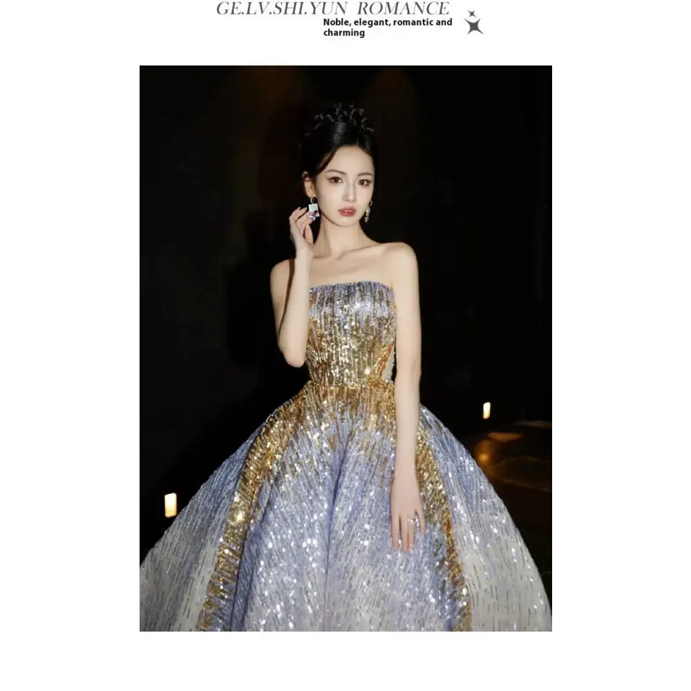 Purple tube embossed toast dress featuring a shimmering gold sequined strapless ball gown with a voluminous skirt