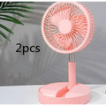 Pink quiet portable telescopic folding fan with circular grille and sleek modern design on slender stand