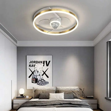 Quiet simple modern circular ceiling fan with integrated led lighting gold accents and transparent motor housing
