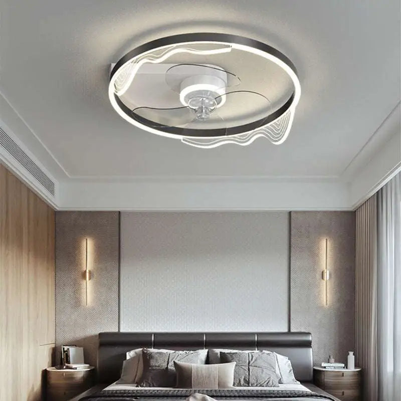 Quiet simple modern circular ceiling fan with integrated led lighting gold accents and transparent motor housing