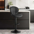 Black velvet upholstered bar stool with vertical pleats offering luxury women’s fashion and ultimate comfort