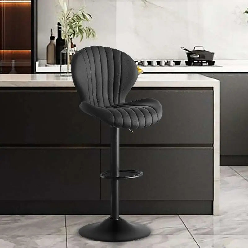 Black velvet upholstered bar stool with vertical pleats offering luxury women’s fashion and ultimate comfort