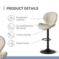 Quilted cream velvet upholstered bar stool with curved backrest cushion and black metal pedestal for luxury women’s fashion seating