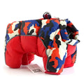 A puffy red and blue camouflage quilted pet dog coat with zipper closure for cold weather protection