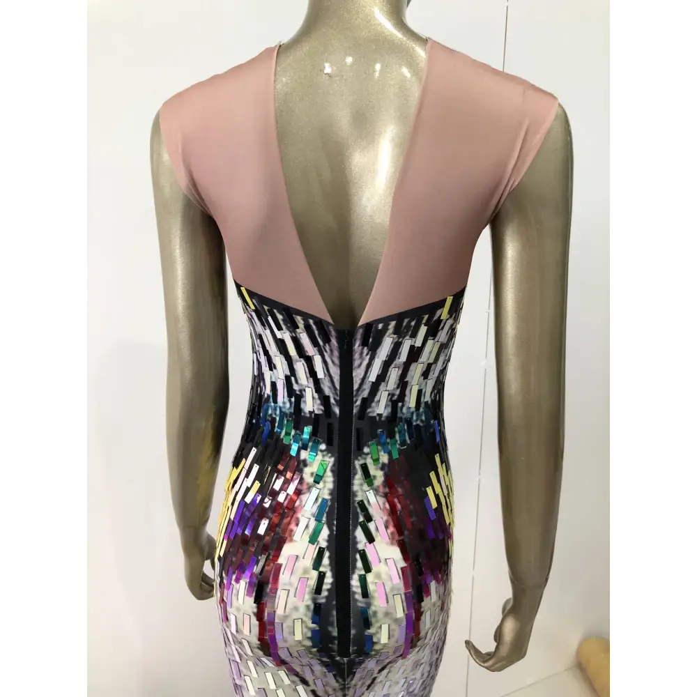 Back view of a soft pink sequin evening dress with deep v-back and rainbow gradient sequin pattern for female singer costume