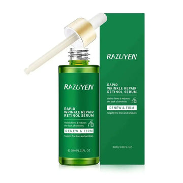 Green glass bottle of razuyen retinol serum with gold dropper cap and white pipette for fine lines face serum