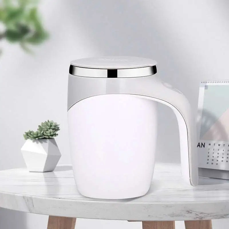 White ceramic rechargeable model automatic stirring cup with sleek silver lid and handle featuring automatic stirring function