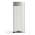 A sleek rechargeable portable night light led camping light with a warm yellow beam and minimalist silver top on black base