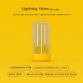 A sleek rechargeable portable night light led camping light with a transparent body and vibrant yellow base