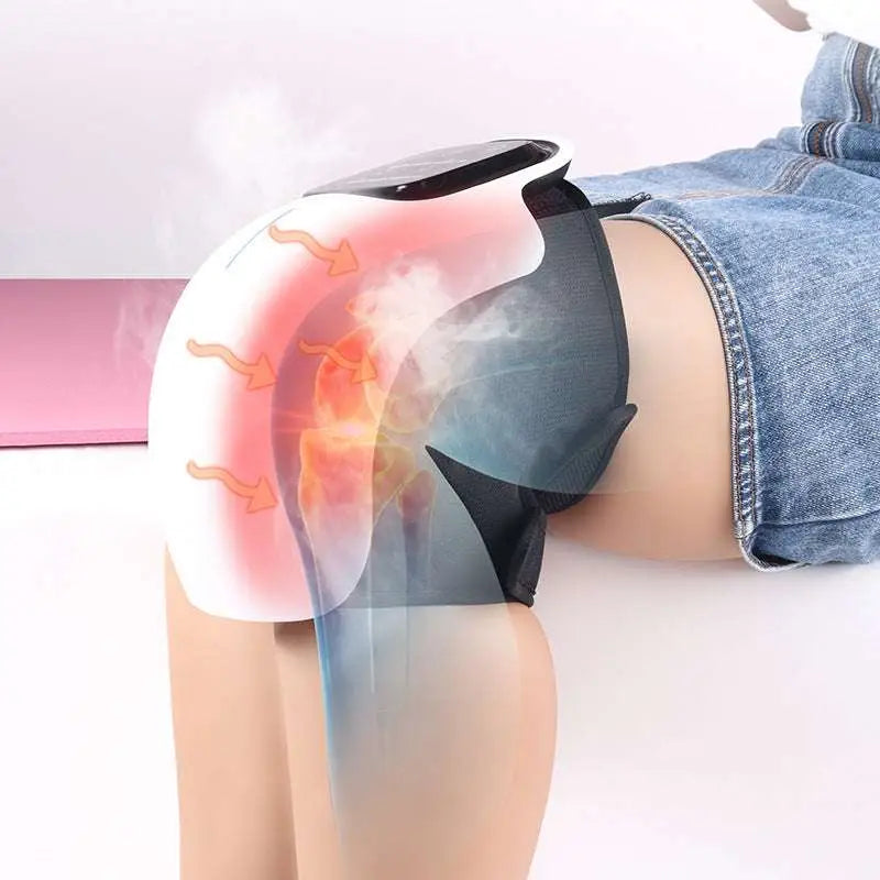 White and black rechargeable vibration knee massager with hot compress steam feature and sleek ergonomic design