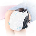 White and black rechargeable knee massager with digital display and soft silicone straps featuring sleek ergonomic design