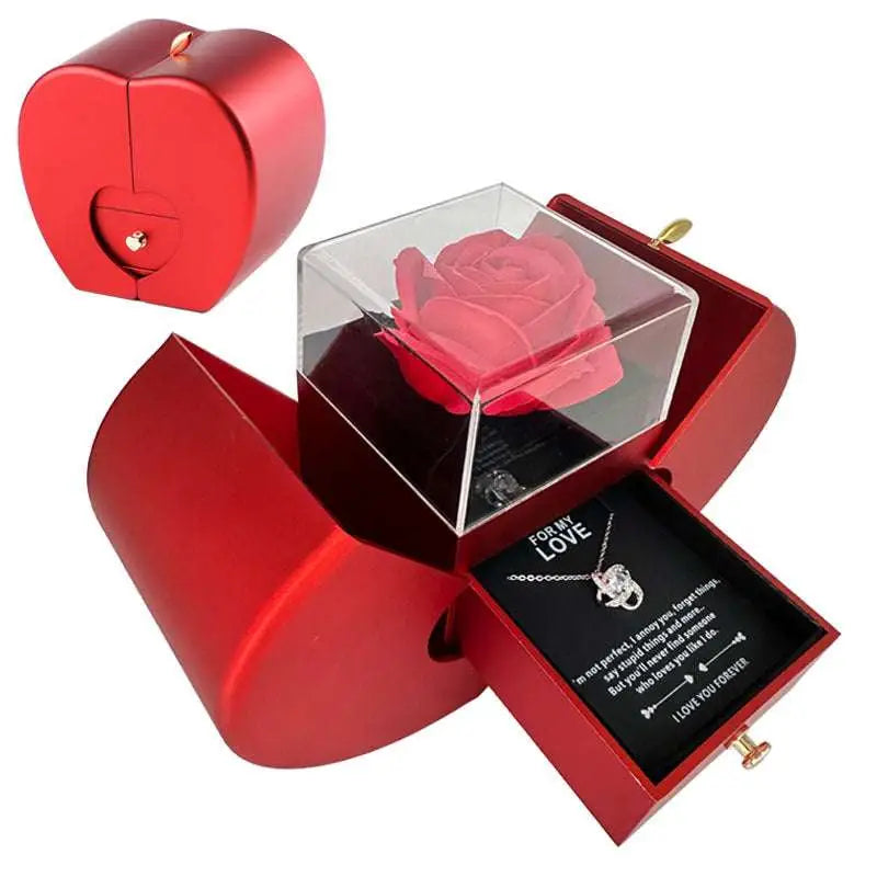 Red apple jewelry box with a red heart shape, clear acrylic eternal rose compartment, and clavicle chain necklace drawer