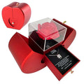 Red apple jewelry box with a red heart shape, clear acrylic eternal rose compartment, and clavicle chain necklace drawer