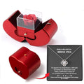 Red apple jewelry box with a clear acrylic drawer containing an eternal rose and red heart-shaped clavicle chain
