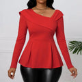 A vibrant red asymmetrical ladies fashion solid color peplum top with long sleeves and a pleated waistband