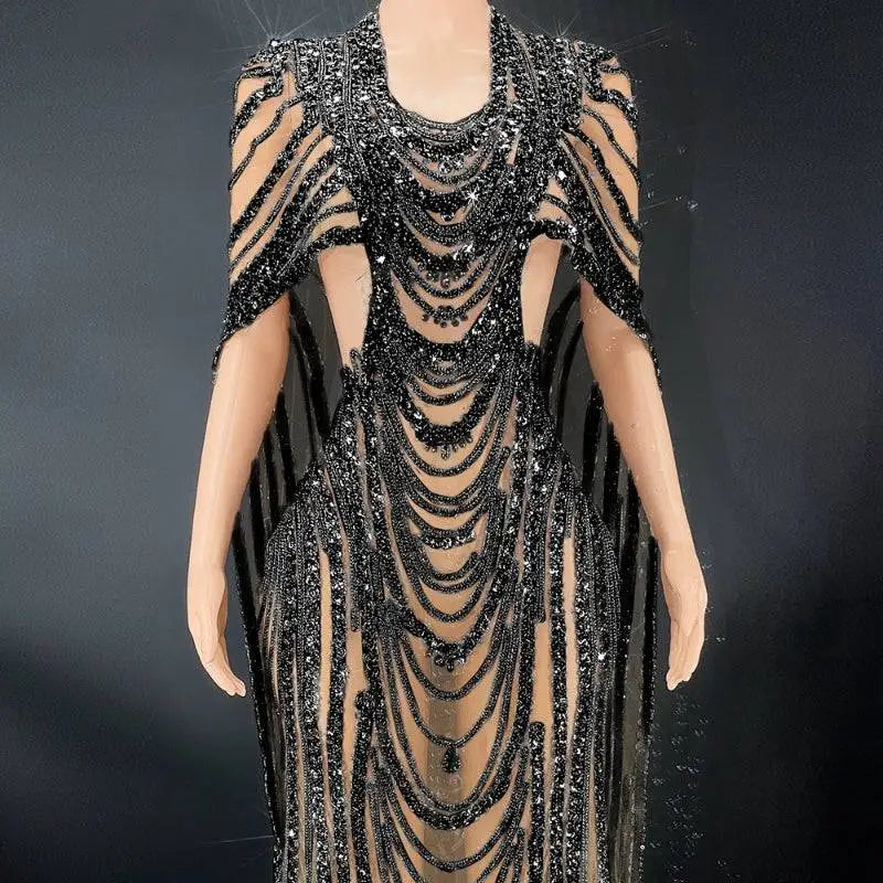 Black sequin evening gown featuring beaded celebrate crystal accents and sheer mesh panels for elegant occasions