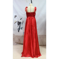 A vibrant red beaded satin temperament long banquet evening dress with sequined bodice and ribbon shoulder ties