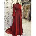 A red beaded stand collar luxury long sleeve gown with intricate embroidery along the high neckline and front panel