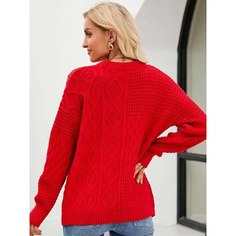 Red cable knit pullover sweater with round neckline and long sleeves ideal for fall winter wear