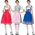 Three women model vibrant red pink and blue checkered dirndl dresses with lace-up fronts for german beer festival clothing